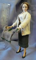 Standing Doll Holding Jumper